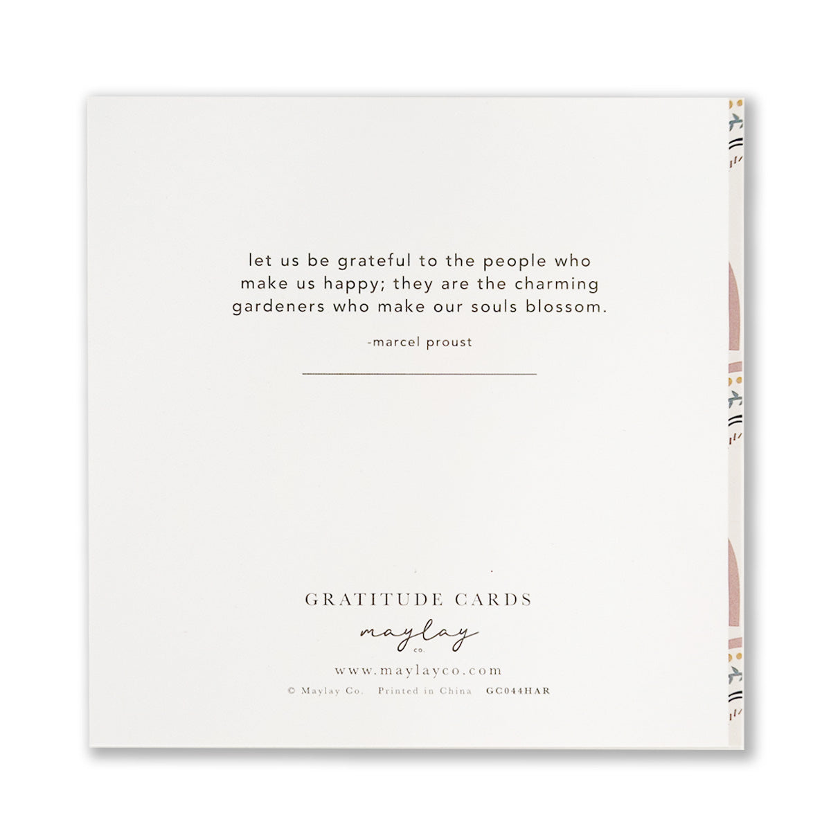 A greeting card featuring a quote by Marcel Proust: "Let us be grateful to the people who make us happy; they are the charming gardeners who make our souls blossom." This Thank You card from Maylay Co.'s Happy Rainbows Gratitude Greeting Cards line boasts decorative patterns on the side.