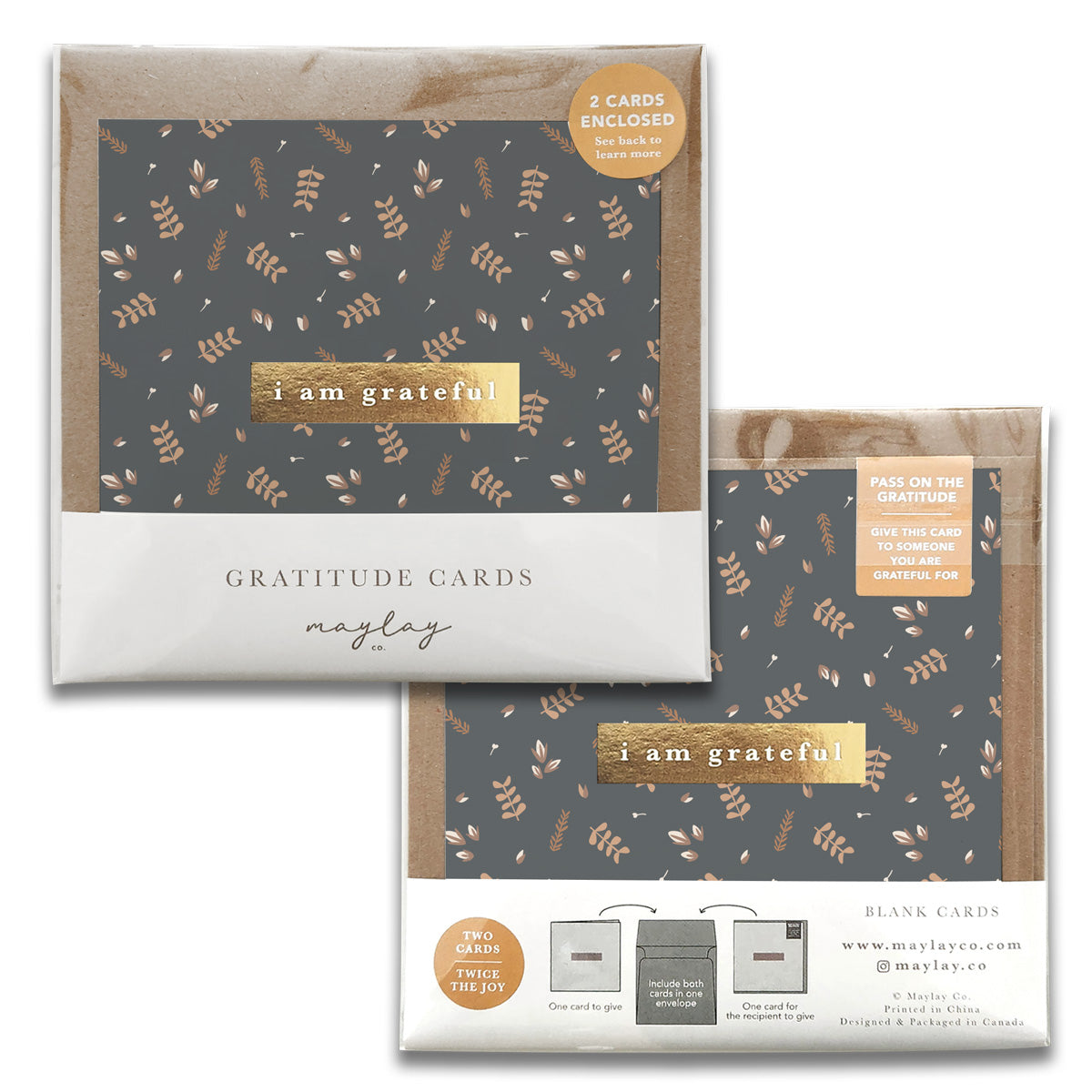 The Buddies Gratitude Greeting Cards by Maylay Co. come in two packs, each showcasing a leafy design on a dark background. The message "I am grateful" is printed on each card, and the packaging highlights that two cards are included, inviting you to share gratitude. They are ideal for expressing thanks as greeting cards.