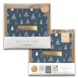 A package of Happy Forest Gratitude Greeting Cards features a forest pattern with stylized trees in various colors on a dark background. The thank you cards are inscribed with "I am grateful." The set includes two gratitude cards and envelopes, with the brand name Maylay Co. displayed at the bottom.