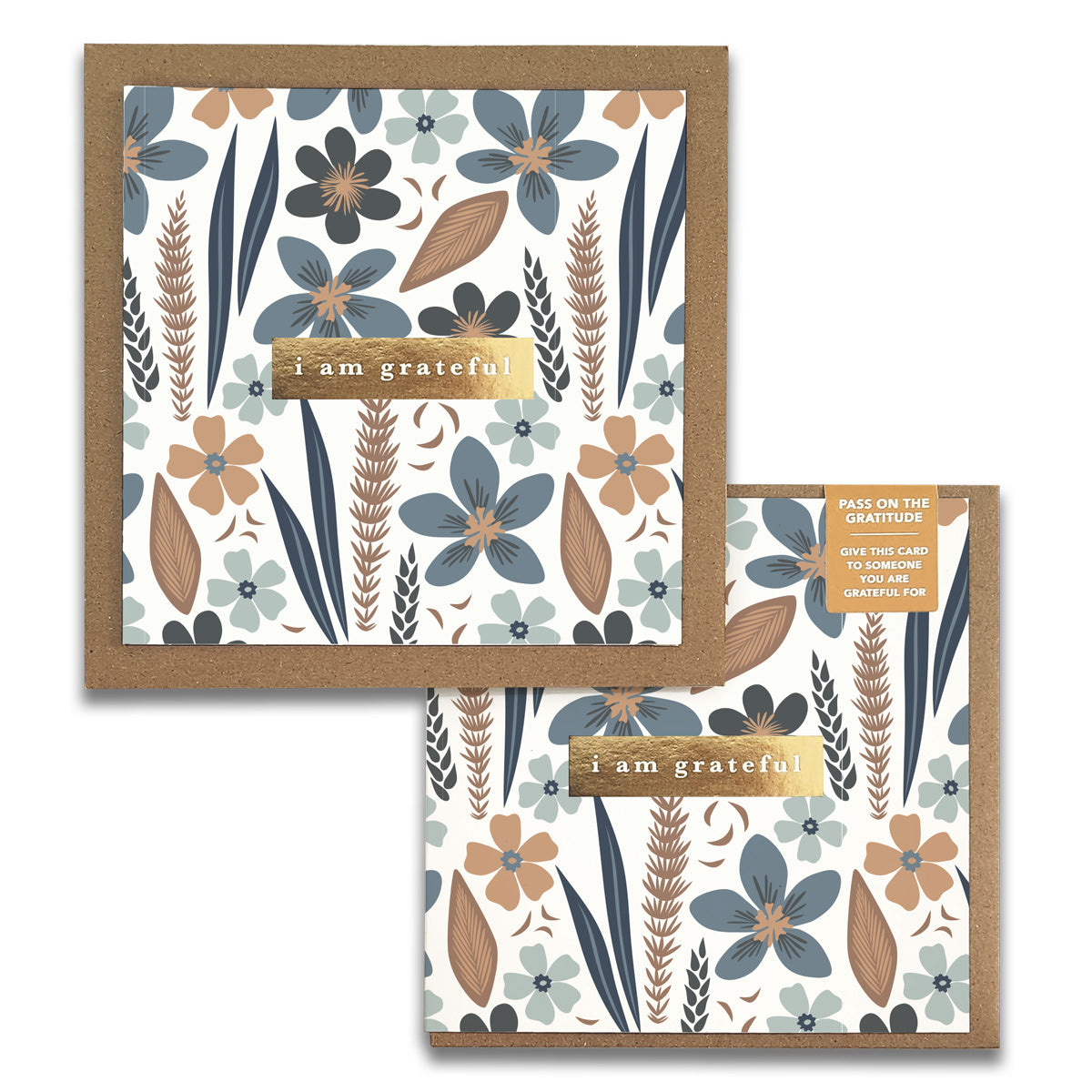 Introducing the Misty Bloom Gratitude Greeting Card by Maylay Co., a premium quality square card adorned with a beautiful floral design featuring blue, brown, and beige flowers and leaves. At its center is a chic brown label with the heartfelt message "I am grateful." Each card includes an orange tag encouraging you to "Pass on the gratitude: give this gratitude card to someone grateful for.