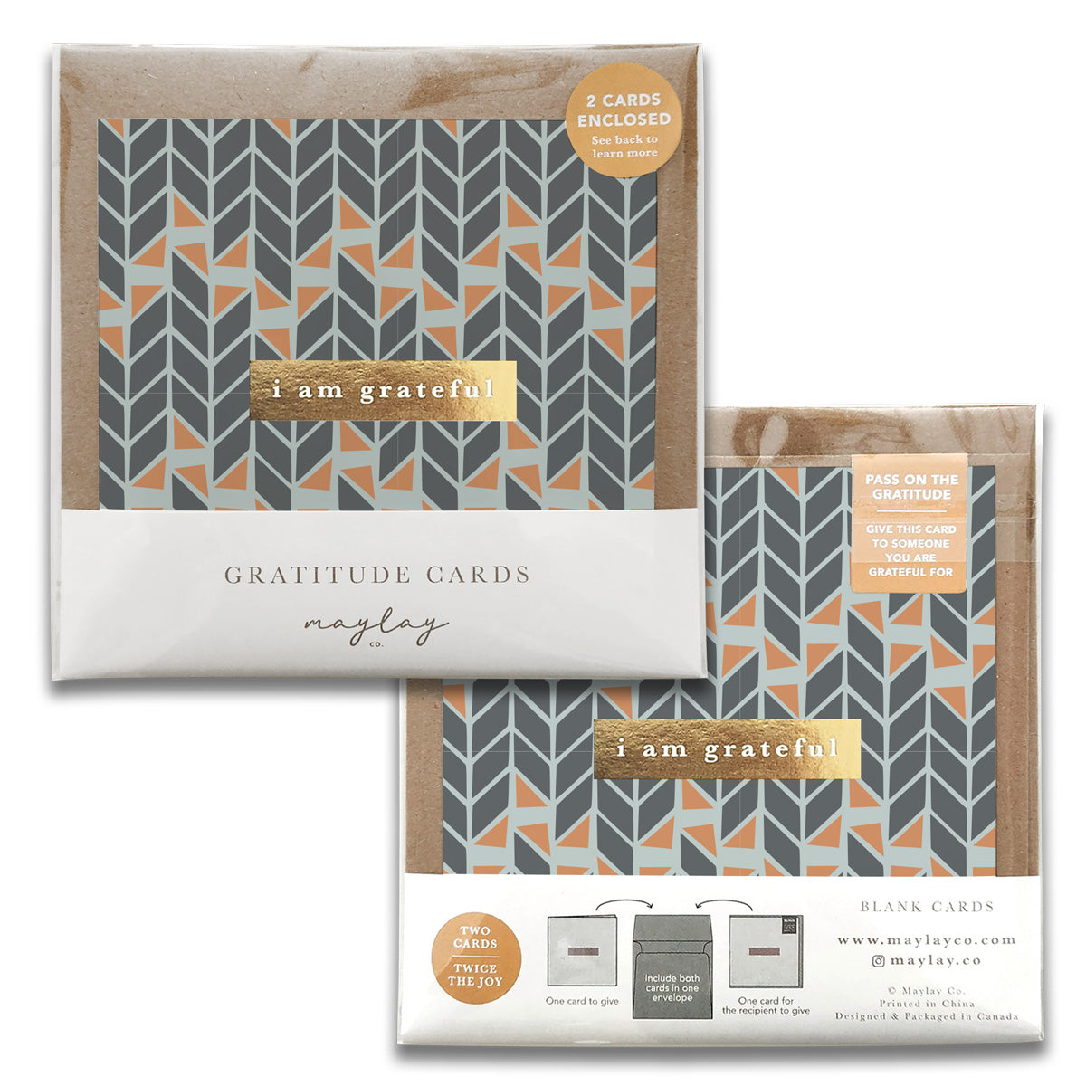 Introducing the Mod Geo Gratitude Greeting Cards by Maylay Co., featuring two premium quality cards adorned with geometric patterns of interlocking arrows in elegant gray and orange hues. Each card is inscribed with the heartfelt message "I am grateful" in striking gold, designed to inspire and share gratitude.