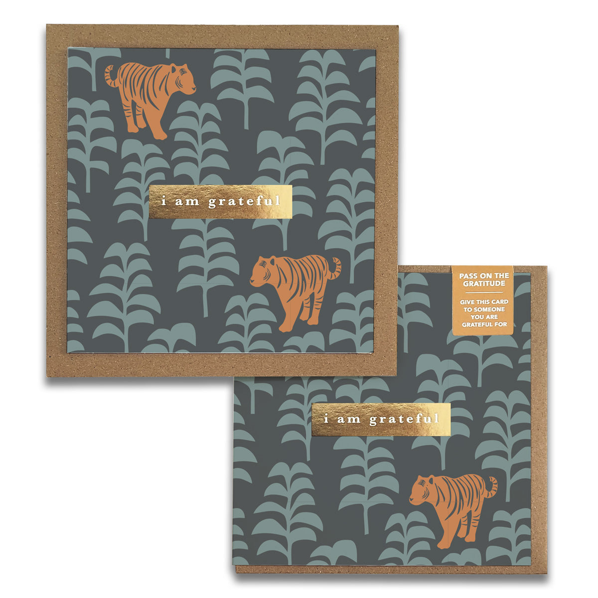 Introducing the Tigers Gratitude Greeting Card by Maylay Co., featuring an orange tiger and the phrase "I am grateful" set against a dark green background with an intricate leaf pattern. A small label encourages sharing gratitude, while a brown border elegantly frames this square card, making it a perfect and thoughtful gesture for expressing thanks.