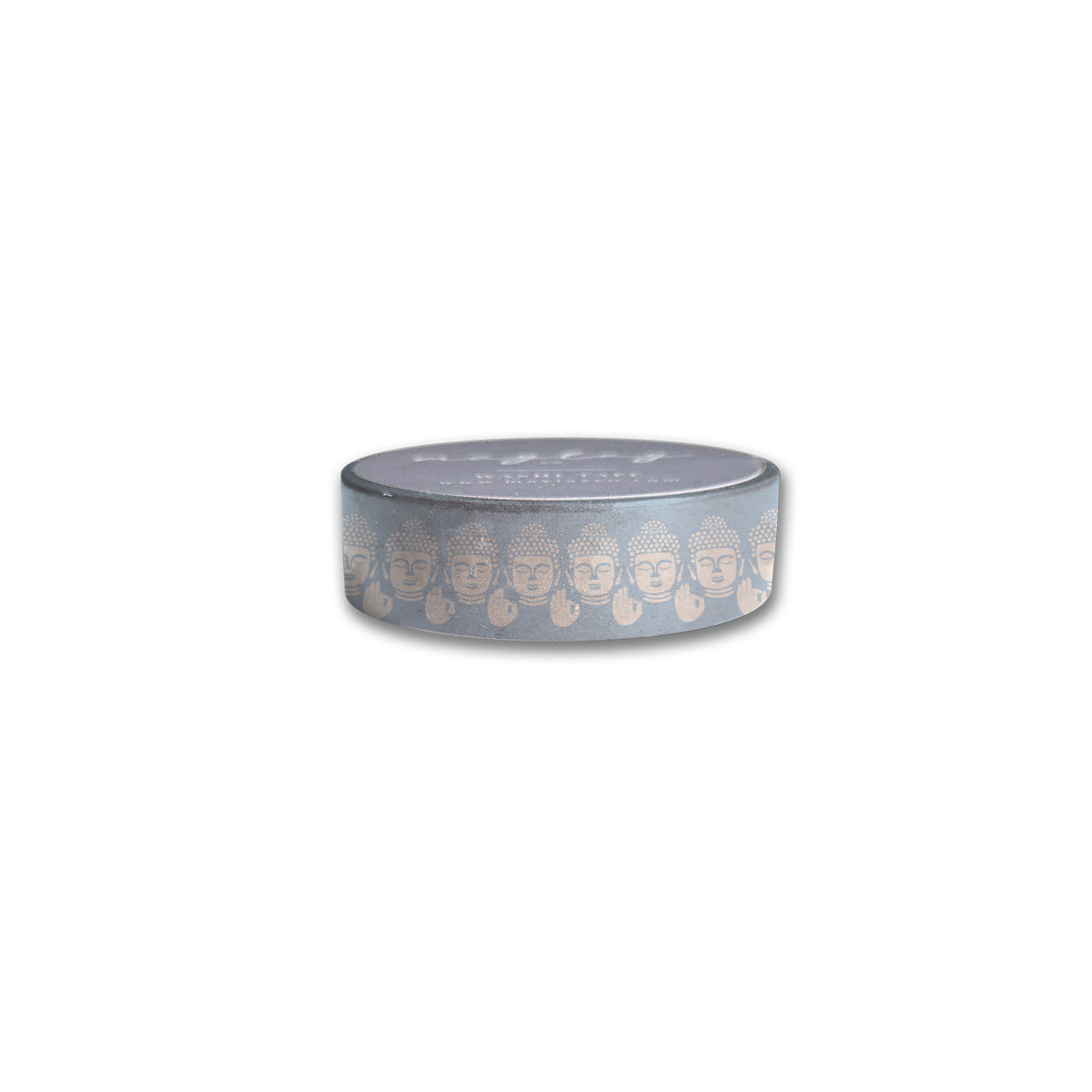 A roll of Maylay Co.'s Be Still Washi Tape features a pattern of white Buddha faces against a light blue background. This decorative washi tape is impeccably rolled, providing a clean, glossy finish.