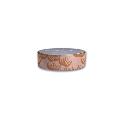 The Block Print Floral Washi Tape by Maylay Co. showcases a striking design of orange palm leaves against a light brown background. Ideal for scrapbooking or journaling, this delightful tape stands out beautifully against a white backdrop.