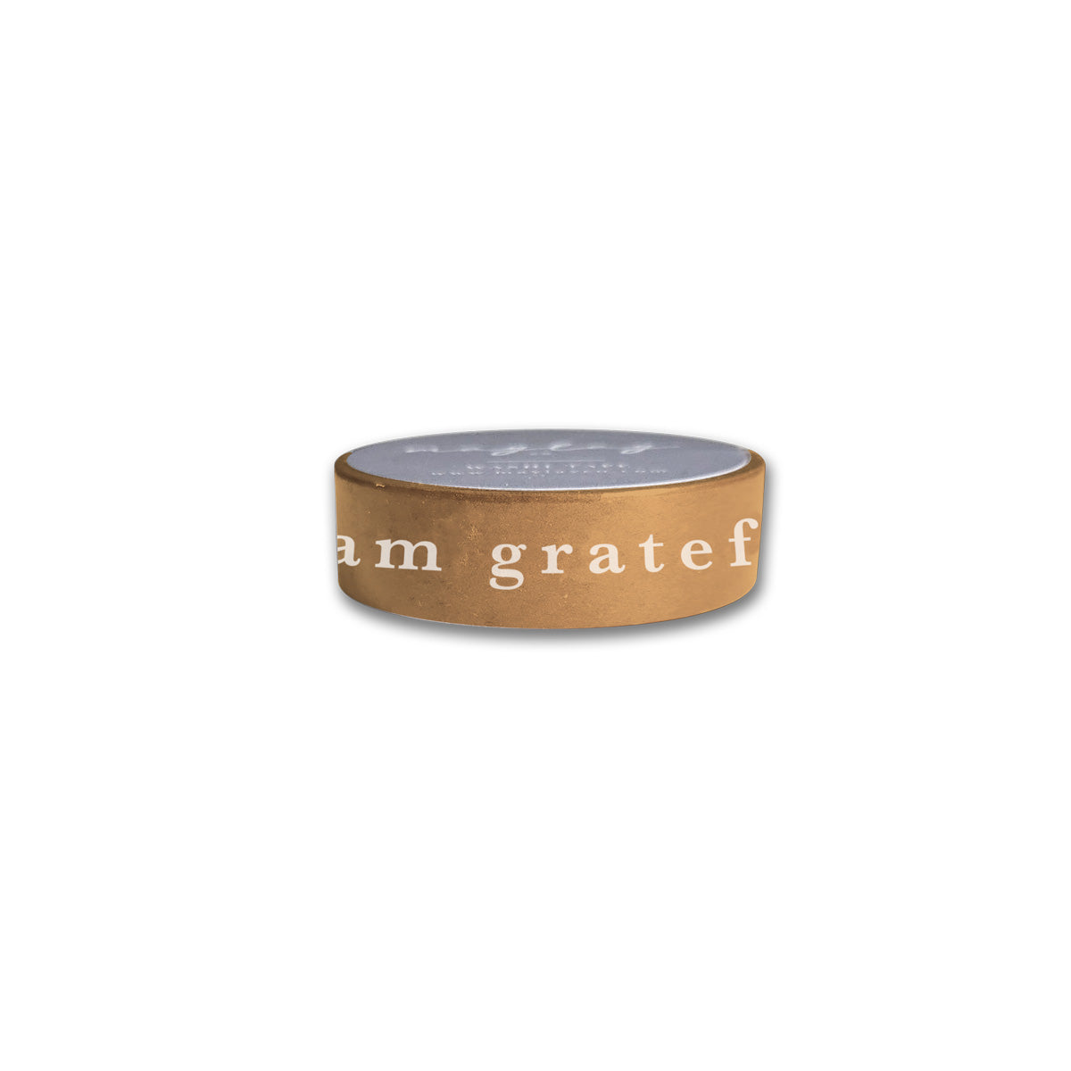 The "I Am Grateful Washi Tape - Gold Yellow" by Maylay Co. captures the elegant charm of decorative washi tapes with its gold-yellow design, reminiscent of a brown cylindrical candle holder that has "I am grateful" elegantly printed in white. Its design's simplicity is accentuated against a plain white background, hiding the top and enhancing its serene beauty.