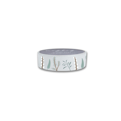 The "Winter Flora Washi Tape" by Maylay Co. features a light green background with a nature-themed design of white and brown plants and leaves. It's cylindrical, flat on top, and an excellent choice for scrapbooking supplies, adding elegance to any project.