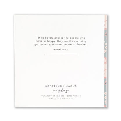 Presenting the Butterfly Gratitude Greeting Card from Maylay Co., part of our exquisite Stationery Collection. This card features a heartfelt quote by Marcel Proust: "Let us be grateful to the people who make us happy; they are the charming gardeners who make our souls blossom." It is beautifully adorned with a decorative floral border on the right side.