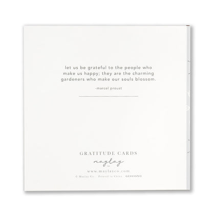 A greeting card featuring a quote by Marcel Proust: "Let us be grateful to the people who make us happy; they are the charming gardeners who make our souls blossom." Below, it reads Snowflakes Gratitude Greeting Cards by Maylay Co., www.maylayco.com with additional text.